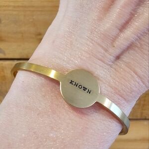 Brushed Goldtone Cuff Bracelet Engraved with "KNOWN"